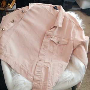 Pink distressed denim jacket